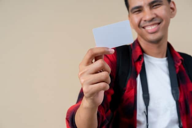A close-up image of a student receiving a Becas Benito Juárez payment card, with a focus on the card and the student's hands. The background should be slightly blurred, showing a school or public building.