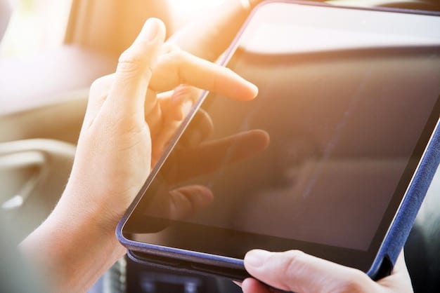 A close-up of a hand pointing at a tablet screen displaying various car loan options and interest rates, highlighting the importance of comparing different financing options.