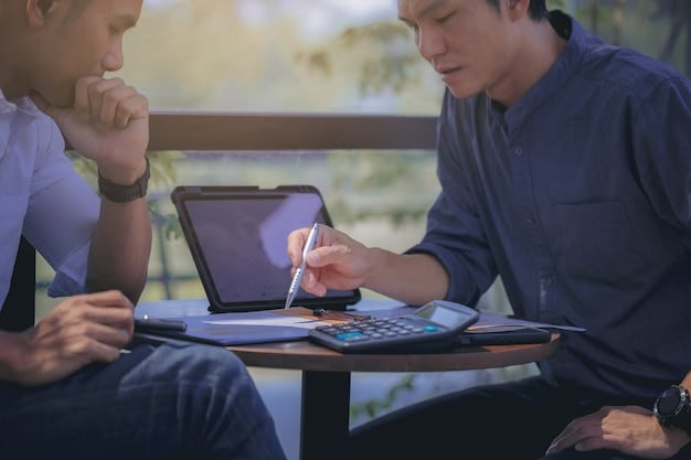 A person using a financial calculator to compare the costs and benefits of refinancing a mortgage. The calculator is displaying a complex equation, and the person is looking intently at the screen.