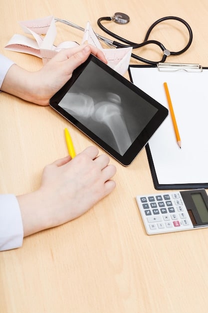 A close-up of a person's hands using a calculator and reviewing mortgage documents, with a pen resting on the table. The scene is well-lit and professional, symbolizing careful financial planning.